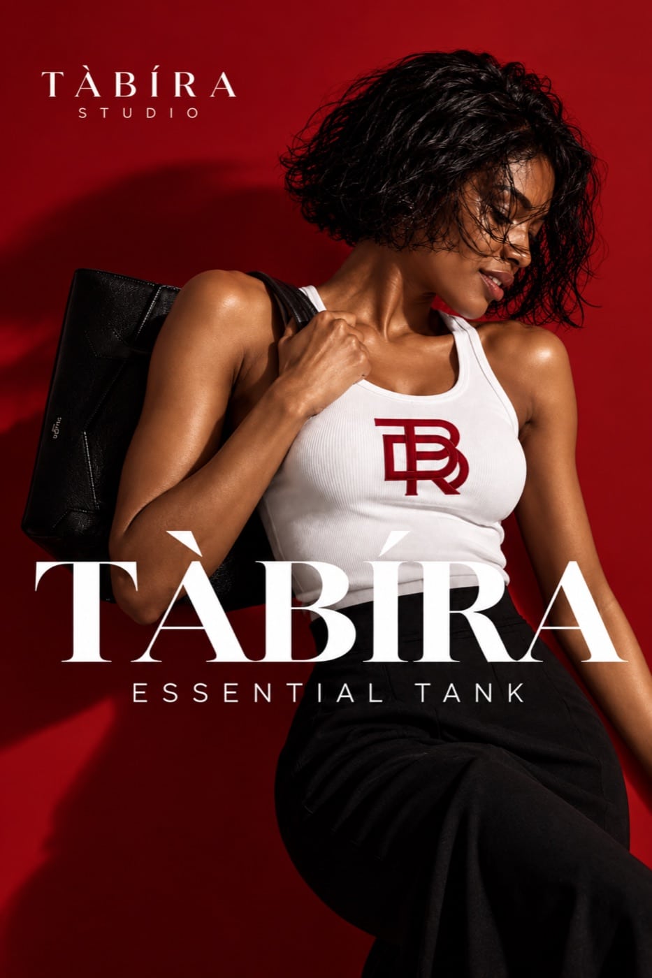 TÀBÍRA Essential Tank, a white ribbed tank top with the TÀBÍRA monogram